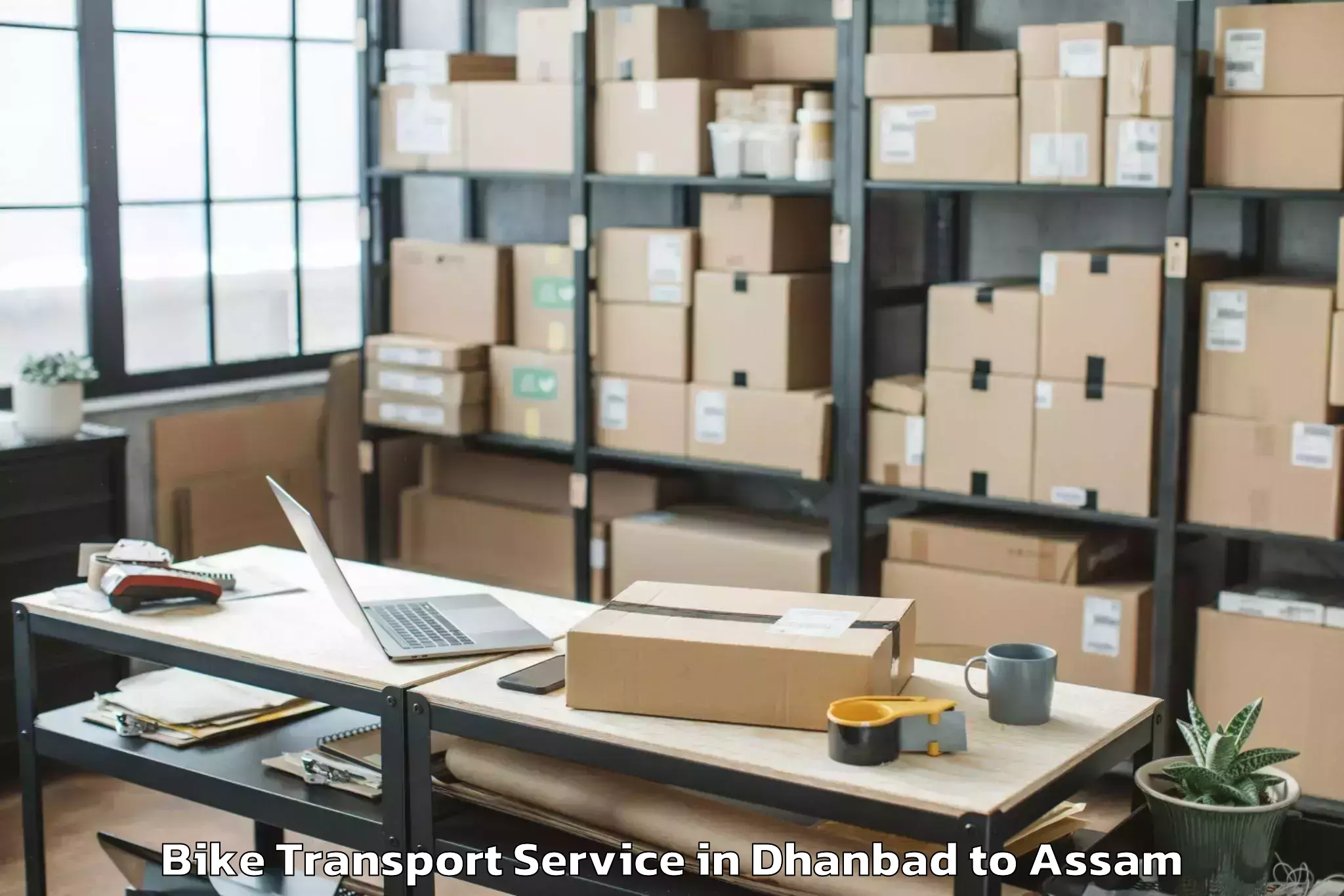 Book Your Dhanbad to Rowriah Airport Jrh Bike Transport Today